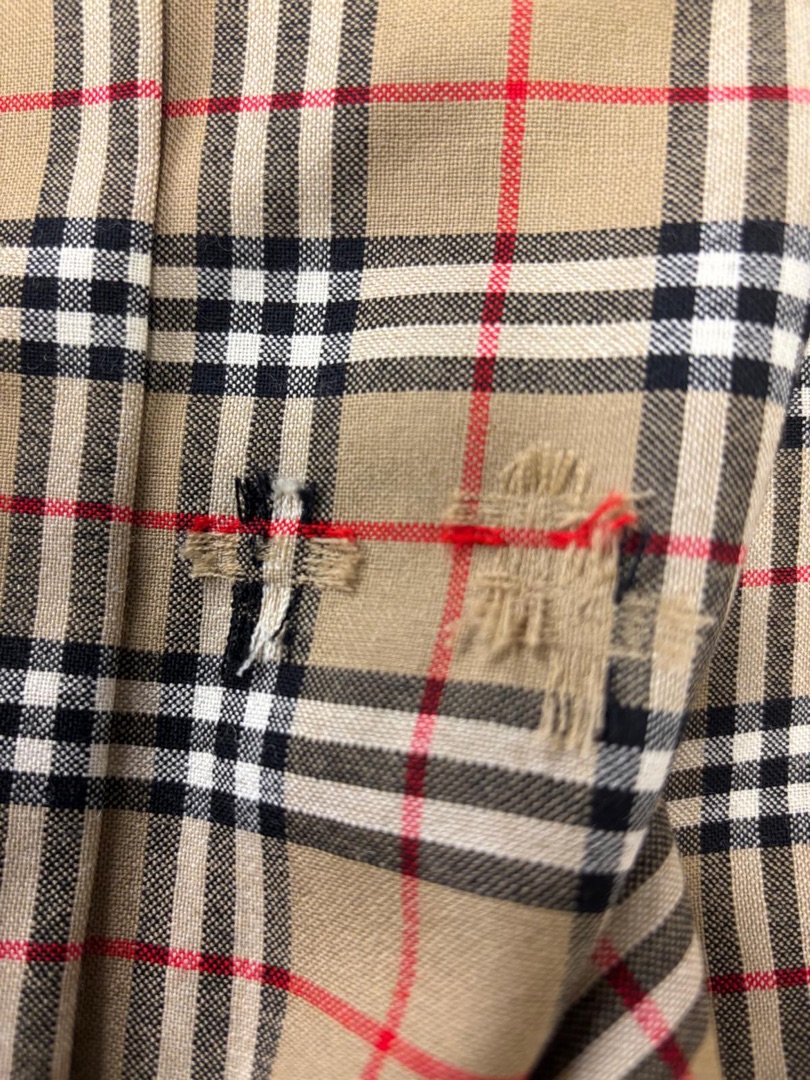 Burberry check fabric with damage
